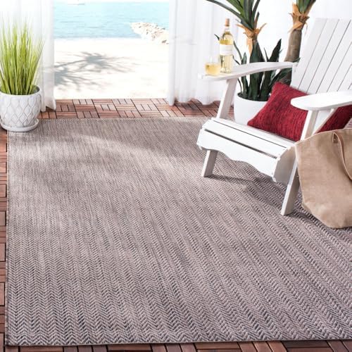 SAFAVIEH Outdoor Area Rug 6'7"x9'6" by Unknown